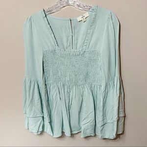 Light turquoise boutique long sleeve flowy blouse